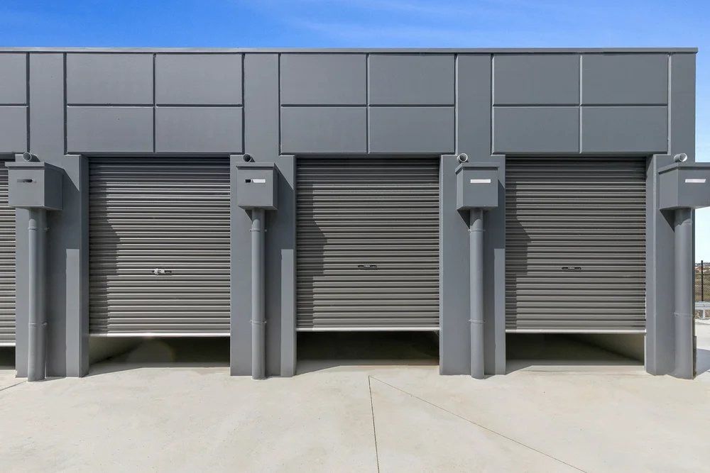 Secure AlterSpaces Breakwater storage units with grey automatic roller doors, Breakwater Geelong